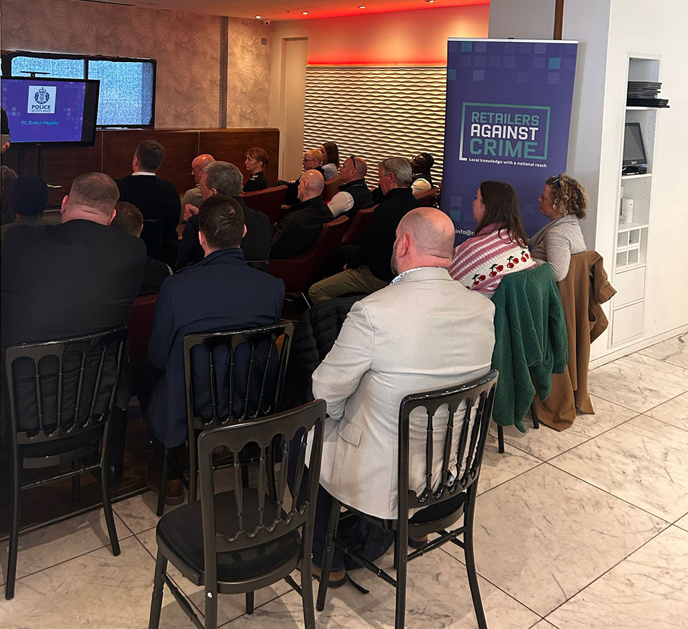 An engaged audience listening to the speakers 