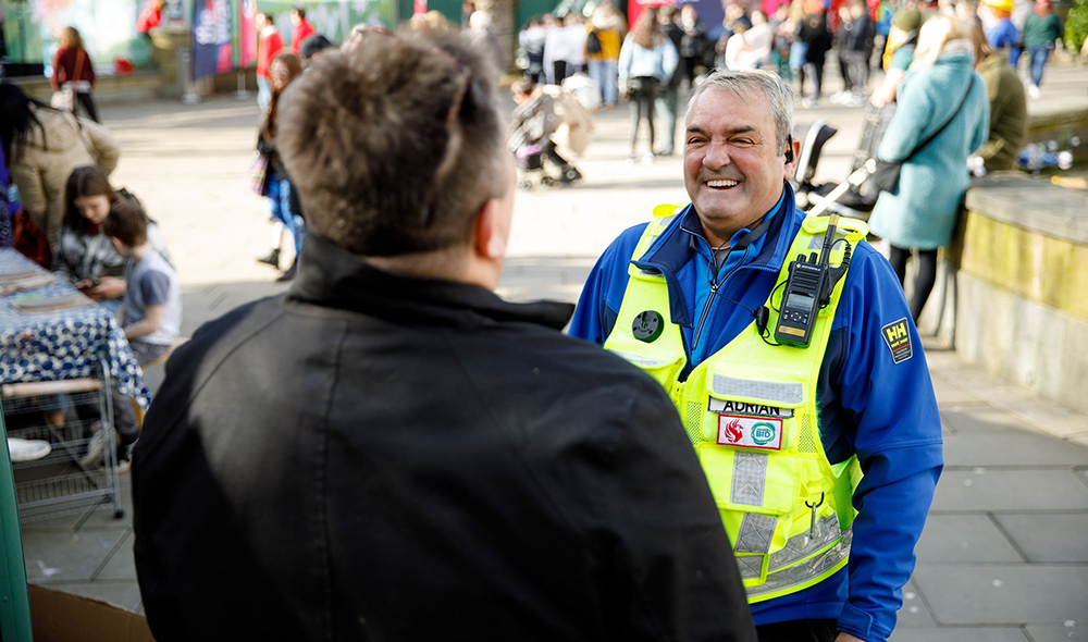 Swansea Against Business Crime Wardens speaking to the public